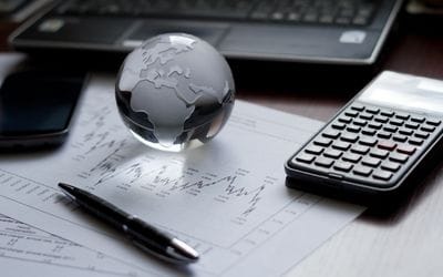 Strategic financial planning with calculator and business documents